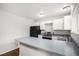 Clean kitchen space featuring white cabinets, modern appliances, and a functional design for everyday cooking at 3246 S Nucla St, Aurora, CO 80013