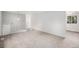 Spacious loft with carpet and natural light, showcasing an open floor plan, and staircase access at 3246 S Nucla St, Aurora, CO 80013