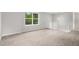 Open, carpeted loft area with white railings, perfect for a home office or additional living space at 3246 S Nucla St, Aurora, CO 80013