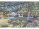 Backyard featuring a lawn and mature landscaping at 10311 Adams Pl, Thornton, CO 80229