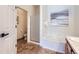 Bright bathroom featuring a bathtub with tiled walls, perfect for relaxation at 10311 Adams Pl, Thornton, CO 80229
