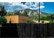 Exterior view showcasing the building's design with mountain views against a stunning sky backdrop at 2800 Aurora Ave # 121, Boulder, CO 80303