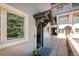 Inviting front entrance featuring a covered doorway with large windows and a well-maintained walkway at 2800 Aurora Ave # 121, Boulder, CO 80303