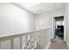 Second story hallway with neutral colored carpet and skylight offering natural light at 2800 Aurora Ave # 121, Boulder, CO 80303