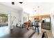Modern kitchen with breakfast bar adjacent to the dining area and entryway at 2800 Aurora Ave # 121, Boulder, CO 80303