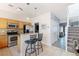 Open kitchen area with a breakfast bar and stainless steel appliances at 2800 Aurora Ave # 121, Boulder, CO 80303
