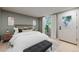 Cozy bedroom with natural light, white linens, stylish bedside tables, and elegant décor at 284 S Lincoln Ave, Louisville, CO 80027