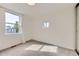 Bedroom with natural lighting, modern features, and a view of the outdoors at 284 S Lincoln Ave, Louisville, CO 80027