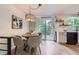 Cozy kitchen nook with a dining area, offering an informal space for meals, featuring a view of the deck at 284 S Lincoln Ave, Louisville, CO 80027