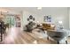 Bright living room with modern decor, wood floors, and stylish furnishings, creating a welcoming atmosphere at 284 S Lincoln Ave, Louisville, CO 80027