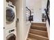 Convenient laundry area located by the staircase, creating a functional space at 284 S Lincoln Ave, Louisville, CO 80027
