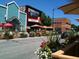 Charming street view with colorful buildings, outdoor dining, and decorative flower boxes at 284 S Lincoln Ave, Louisville, CO 80027