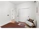 Bright bedroom with a cozy bed, and access to closets and hallway at 2121 Hummingbird Way # 204, Georgetown, CO 80444