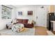 Modern living room with sectional sofa and mountain view at 2121 Hummingbird Way # 204, Georgetown, CO 80444