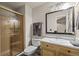 Functional bathroom features a shower, vanity with storage, and modern fixtures at 6848 Zenobia St # 9, Westminster, CO 80030
