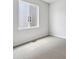 Comfortable bedroom with neutral carpeting and natural light, perfect for relaxation at 1400 Colony Dr, Erie, CO 80026