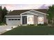Charming single-Gathering home with brick accents, a two-car garage, and a well-manicured lawn at 1400 Colony Dr, Erie, CO 80026