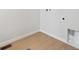 Tiled Laundry room with white walls, floor vent, and access for dryer hookups at 1400 Colony Dr, Erie, CO 80026