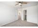 Bedroom features a closet, bathroom entrance, and carpet flooring at 5479 Lost Meadow Trl, Castle Rock, CO 80104
