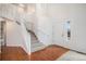 Bright entryway boasting high ceilings, hardwood floors, staircase, and a welcoming ambiance at 5479 Lost Meadow Trl, Castle Rock, CO 80104