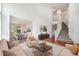 Open-concept living room with high ceilings, neutral décor, staircase, and ample natural light at 5479 Lost Meadow Trl, Castle Rock, CO 80104