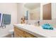 Bathroom with vanity, mirror, decorative accents, and toilet at 19855 Draco Dr, Monument, CO 80132