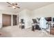 Bedroom with a ceiling fan and carpeted floors and a work station area at 19855 Draco Dr, Monument, CO 80132