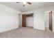 Neutral bedroom with carpet flooring and closet at 19855 Draco Dr, Monument, CO 80132