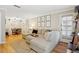 Bright living room with large sectional sofa, area rug, and decor at 2355 E Geddes Ave # C24, Littleton, CO 80122