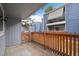 Private patio area with wooden fence offering an outdoor living space, on a sunny day at 2355 E Geddes Ave # C24, Littleton, CO 80122