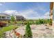 Large backyard patio features stone pavers and professional landscaping at 3059 Morningbird Ln, Castle Rock, CO 80109