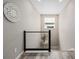 Hallway with a modern staircase, and natural light at 3059 Morningbird Ln, Castle Rock, CO 80109