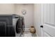 Finished laundry room includes a side-by-side washer and dryer at 3059 Morningbird Ln, Castle Rock, CO 80109