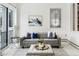 Bright and airy living room features a comfortable sofa and decoratives at 7883 Fox Creek Trl, Franktown, CO 80116