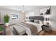 Comfortable main bedroom featuring a neutral color scheme and a large window at 7883 Fox Creek Trl, Franktown, CO 80116