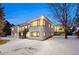 Rear exterior showcasing the home's modern architectural style with large windows at 7883 Fox Creek Trl, Franktown, CO 80116