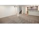 Spacious basement area with carpet flooring, and a bar with cabinets at 10109 E 28Th Ave, Denver, CO 80238