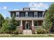 Charming two-story home with a welcoming front porch and well-maintained landscaping at 10109 E 28Th Ave, Denver, CO 80238