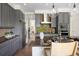 Modern kitchen with stainless steel appliances, granite countertops, and a stylish kitchen island at 10109 E 28Th Ave, Denver, CO 80238