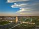 Aerial view of The Aurora Highlands community showcasing the entrance, homes, and landscape at 23738 E 42Nd Ave, Aurora, CO 80019