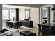 Elegant dining area with modern decor, a stylish chandelier, and ample natural light at 23738 E 42Nd Ave, Aurora, CO 80019