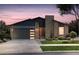 Beautiful single-story home featuring neutral brick, attached garage, and craftsman-style front door at 23738 E 42Nd Ave, Aurora, CO 80019