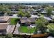 The backyard has a well-maintained lawn, patio, fire pit, and is enclosed by a wooden fence providing privacy at 10769 Carrol Ln, Northglenn, CO 80233
