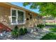 A charming, single-story house with well-maintained landscaping and decorative rocks at 10769 Carrol Ln, Northglenn, CO 80233