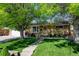 Charming, single-story home with mature trees and a well-manicured lawn at 10769 Carrol Ln, Northglenn, CO 80233
