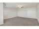 Bedroom with neutral carpet, ceiling fan, double door closet and freshly painted walls at 10272 Greenfield Cir, Parker, CO 80134