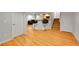 Large finished basement with a bar and hardwood floors, perfect for entertaining at 5906 S Youngfield Way, Littleton, CO 80127