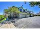 Modern townhome with a two-car garage, well-manicured landscaping, and sunny exposure at 5906 S Youngfield Way, Littleton, CO 80127