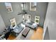 Spacious living room with large windows and ample natural light and modern ceiling fan at 5906 S Youngfield Way, Littleton, CO 80127