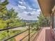 Balcony with mountain views and wood railings at 323 Paradise Rd, Golden, CO 80401